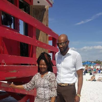 My customer and I . We are at Siesta Key Beach .